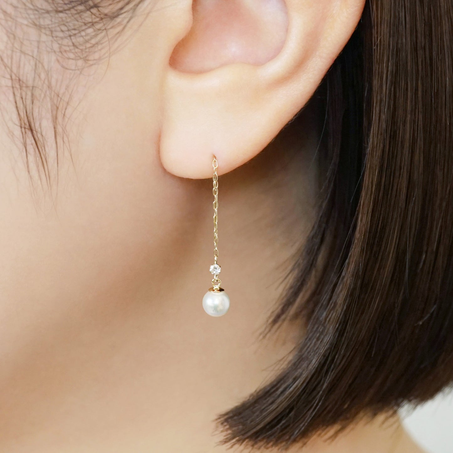 10K Shell Pearl Threader Earrings (Yellow Gold) - Model Image