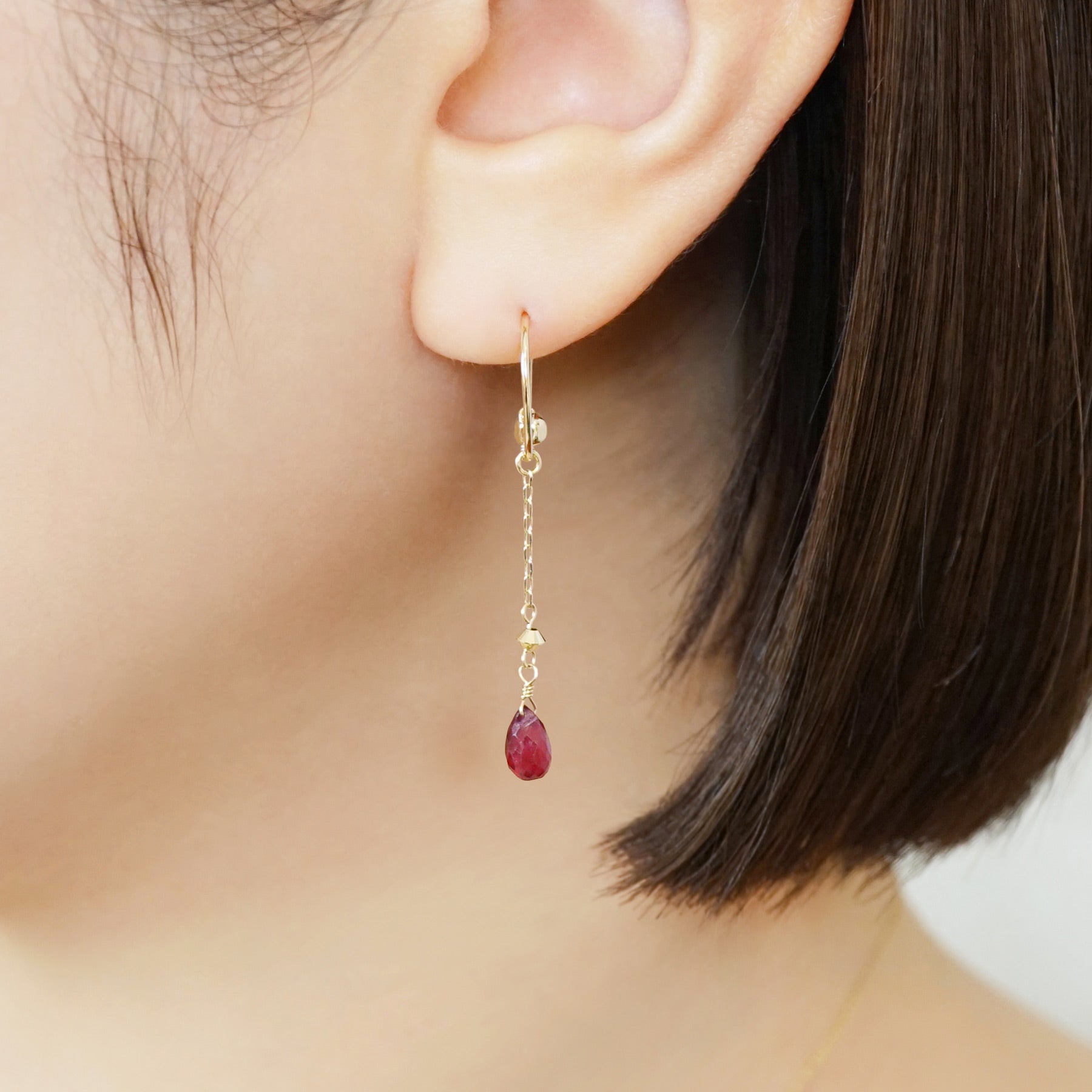 [Palette] 10K Ruby Dew Drop Charms (Yellow Gold) - Model Image