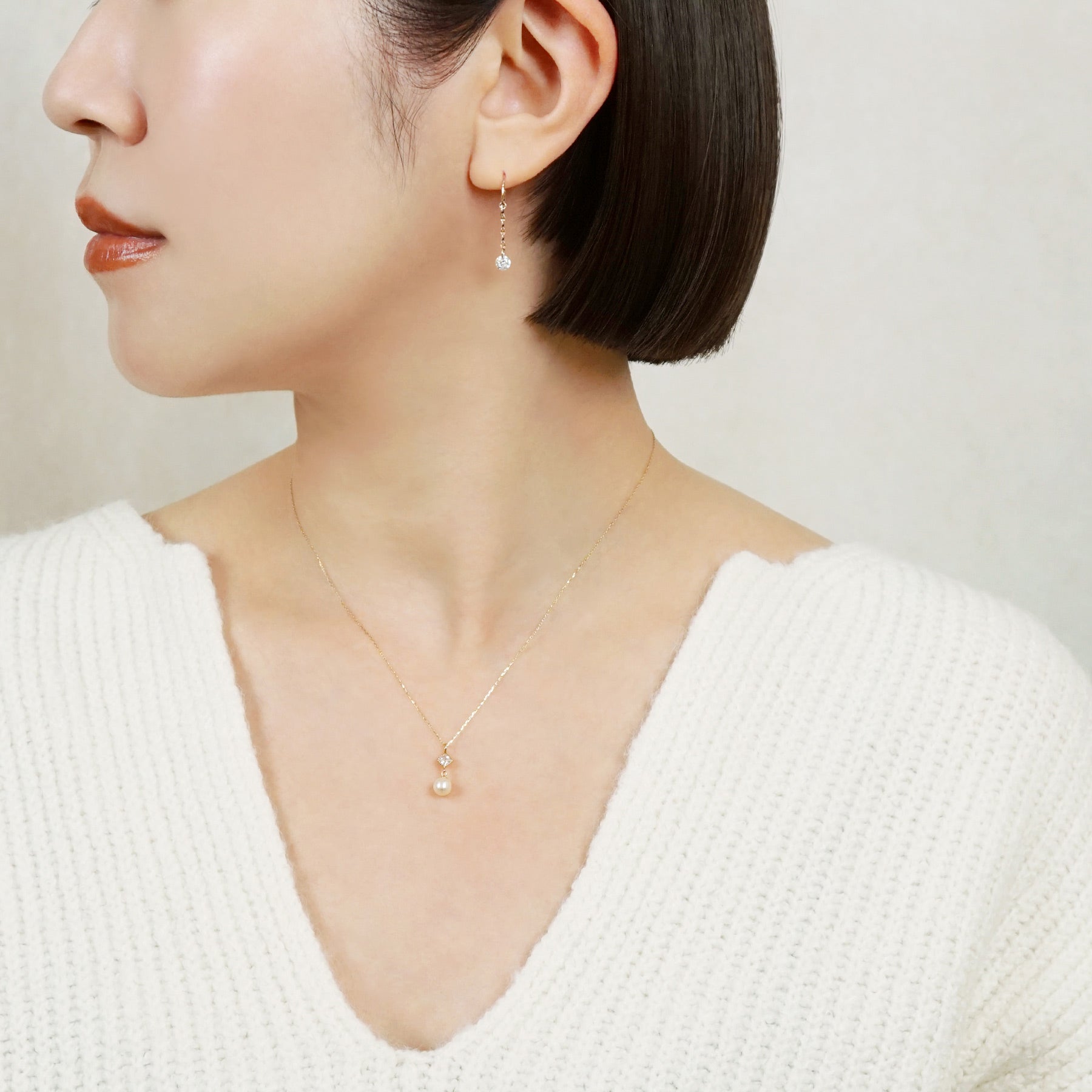 10K Petal Chain Wire Earrings (Rose Gold) - Model Image