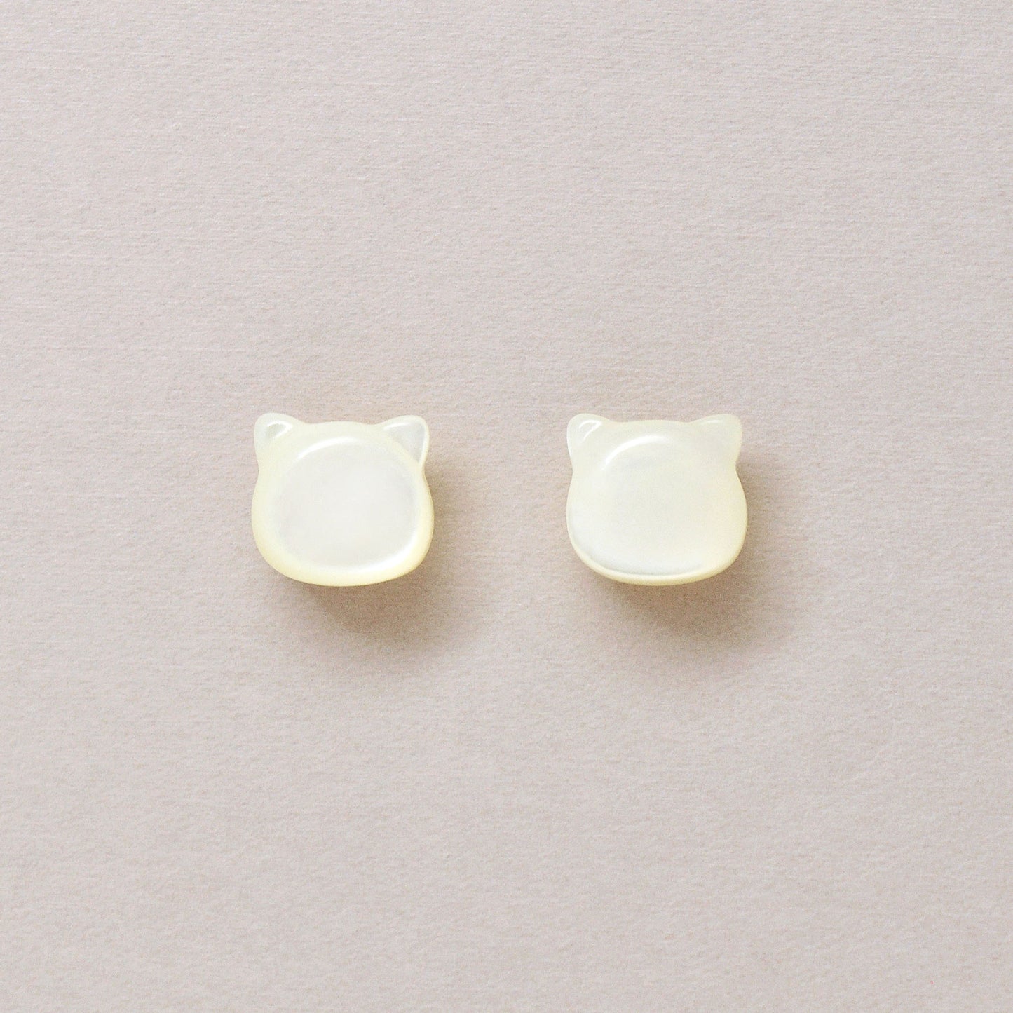 Carved Cat White Shell Ceramic Post Earrings - Product Image