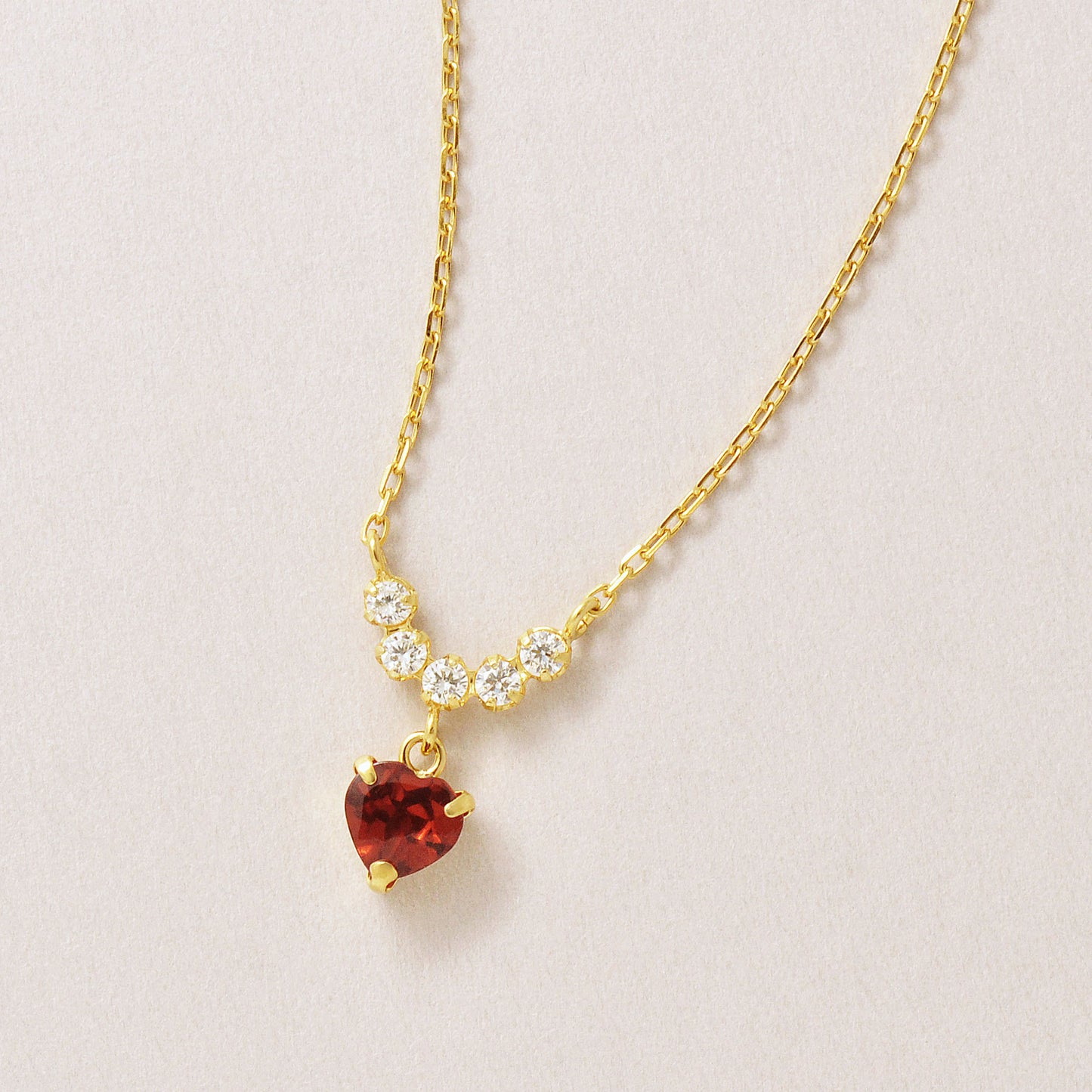 925 Sterling Silver Garnet Heart Swinging Necklace - Product Image