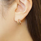 18K/10K Rhombus Cut Cross Hoop Earrings (Yellow Gold / Rose Gold) - Model Image