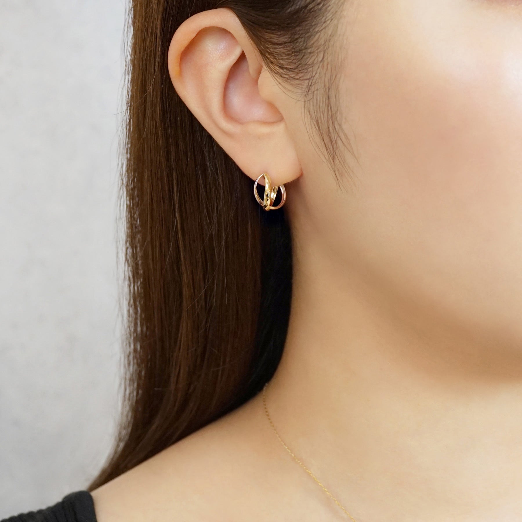 18K/10K Rhombus Cut Cross Hoop Earrings (Yellow Gold / Rose Gold) - Model Image