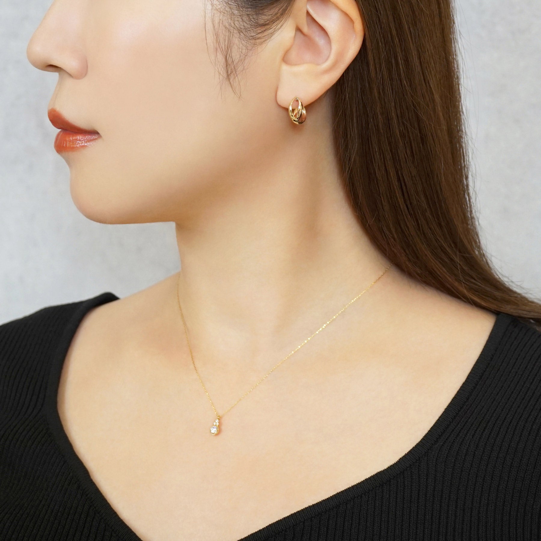 18K/10K Rhombus Cut Cross Hoop Earrings (Yellow Gold / Rose Gold) - Model Image