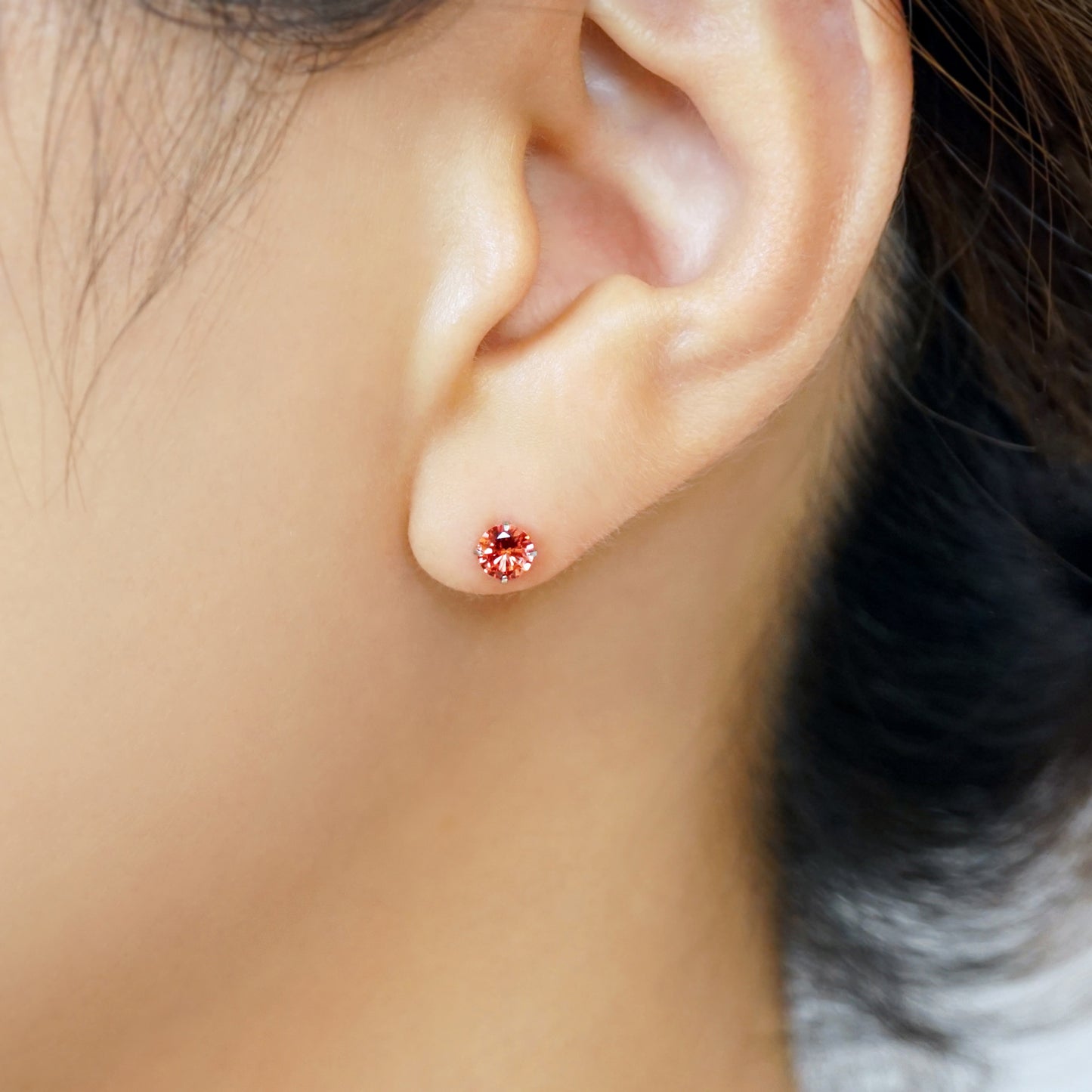 [Second Earrings] Platinum Synthetic Padparadscha Sapphire Earrings - Model Image