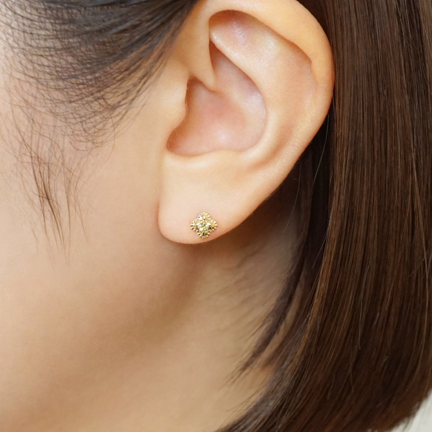 18K/10K Peridot Milgrain Flower Stud Earrings (Yellow Gold) - Model Image