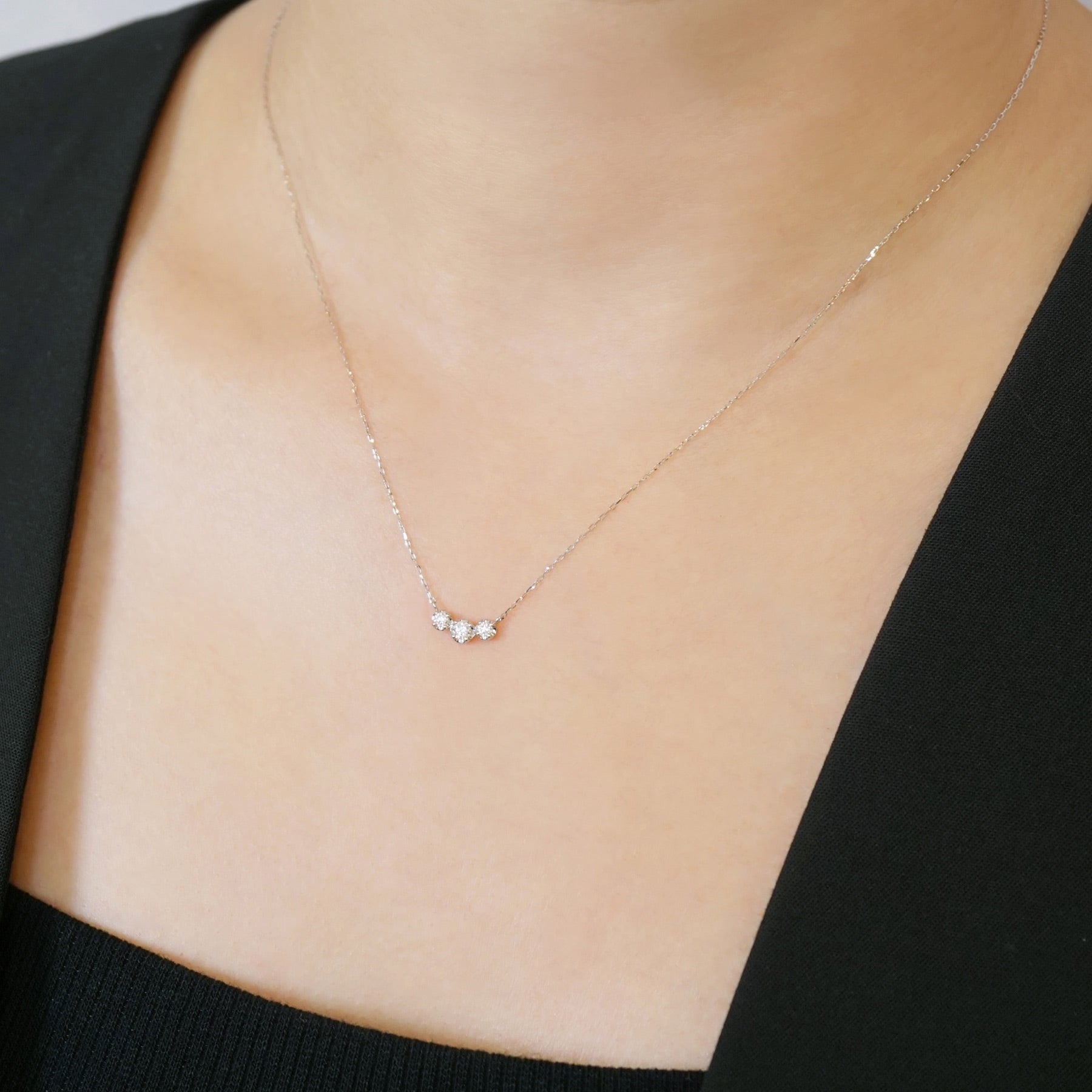 10K Moissanite Trilogy Necklace (White Gold) - Model Image