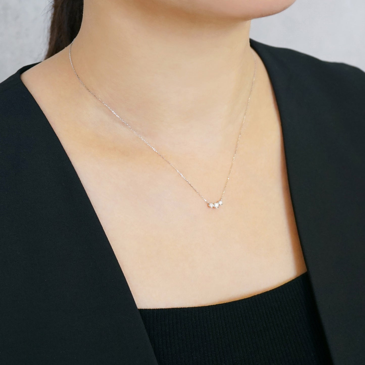 10K Moissanite Trilogy Necklace (White Gold) - Model Image