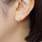 18K/10K Pyramid Pattern Hoop Earrings (Yellow Gold) - Model Image