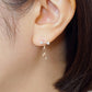 10K Ribbon Swinging Earrings (Rose Gold) - Model Image