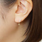 18K/10K Peridot Twist Swinging Earrings (Yellow Gold) - Model Image