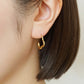 925 Sterling Silver / 10K Yellow Gold Flower Silhouette Earrings - Model Image