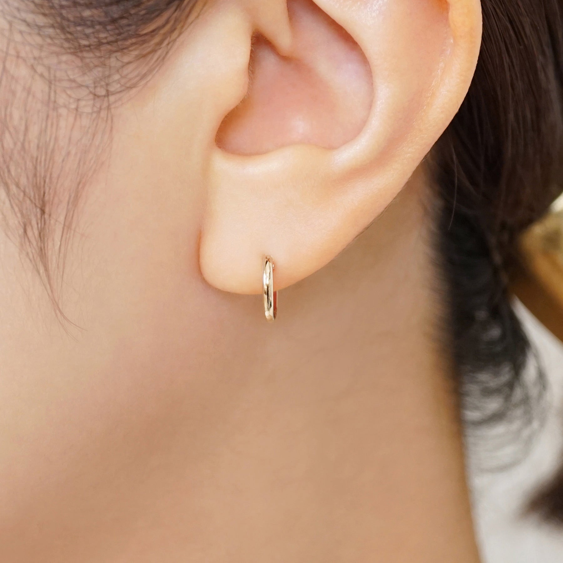 18K/10K Mini Hoop Earrings (Rose Gold) - Model Image