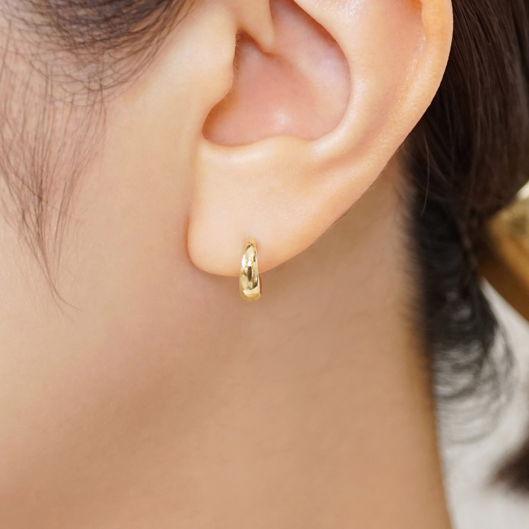 18K/10K Chunky Mini Hoop Earrings (Yellow Gold) - Model Image