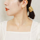 18K/10K Chunky Hoop Earrings (Yellow Gold) - Model Image