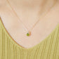 10K Trilliant Peridot Necklace (Yellow Gold) - Model Image