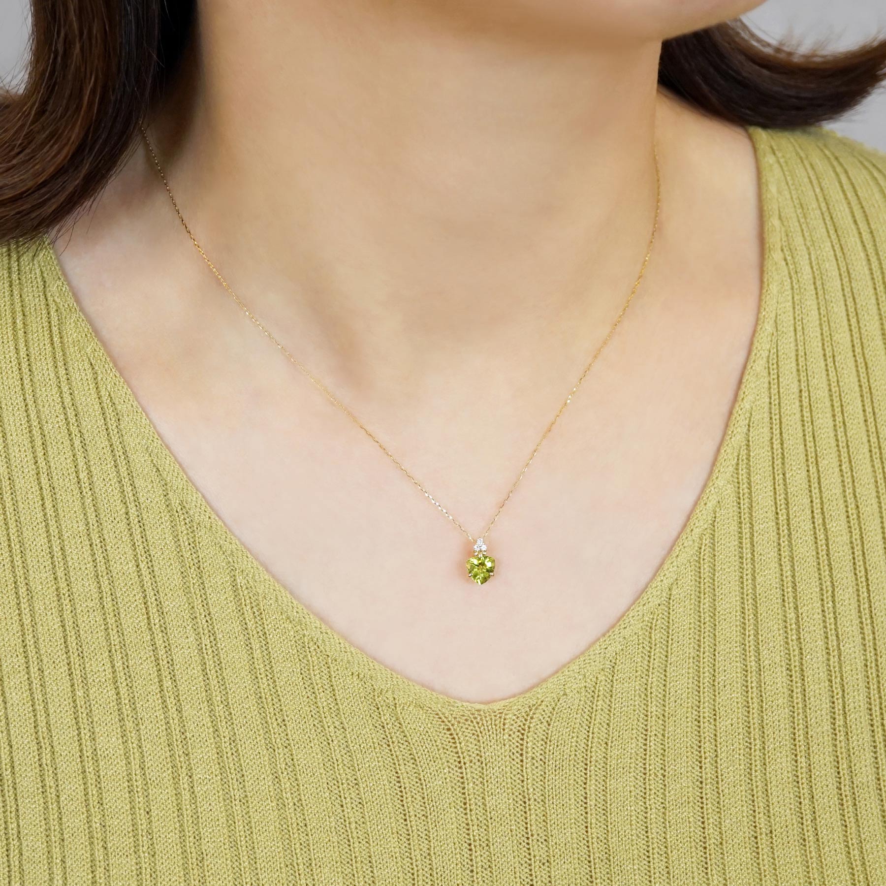 10K Trilliant Peridot Necklace (Yellow Gold) - Model Image