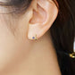 18K/10K Iolite Playful Cat Stud Earrings (Yellow Gold) - Model Image