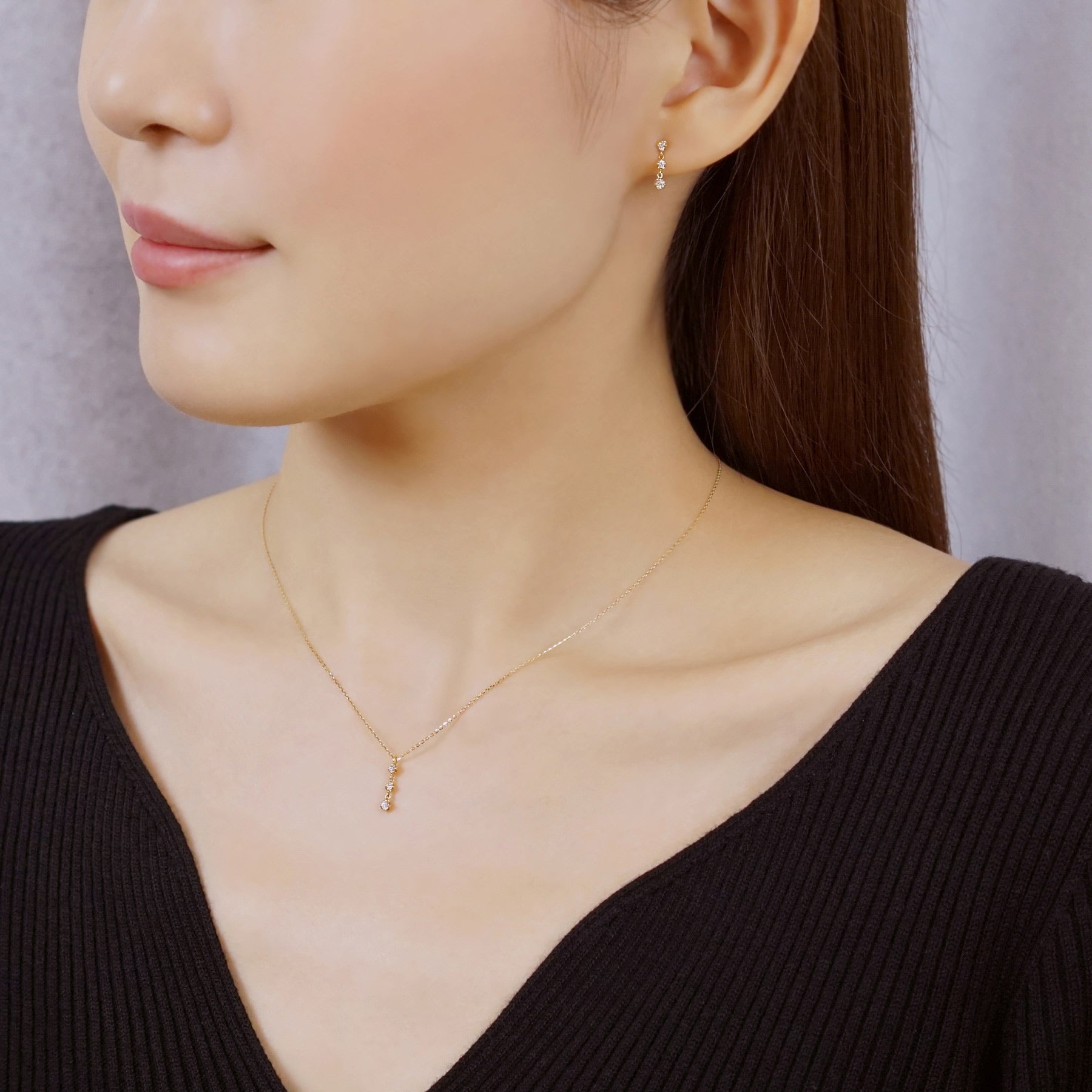 18K Yellow Gold Diamond Trilogy Necklace - Model Image