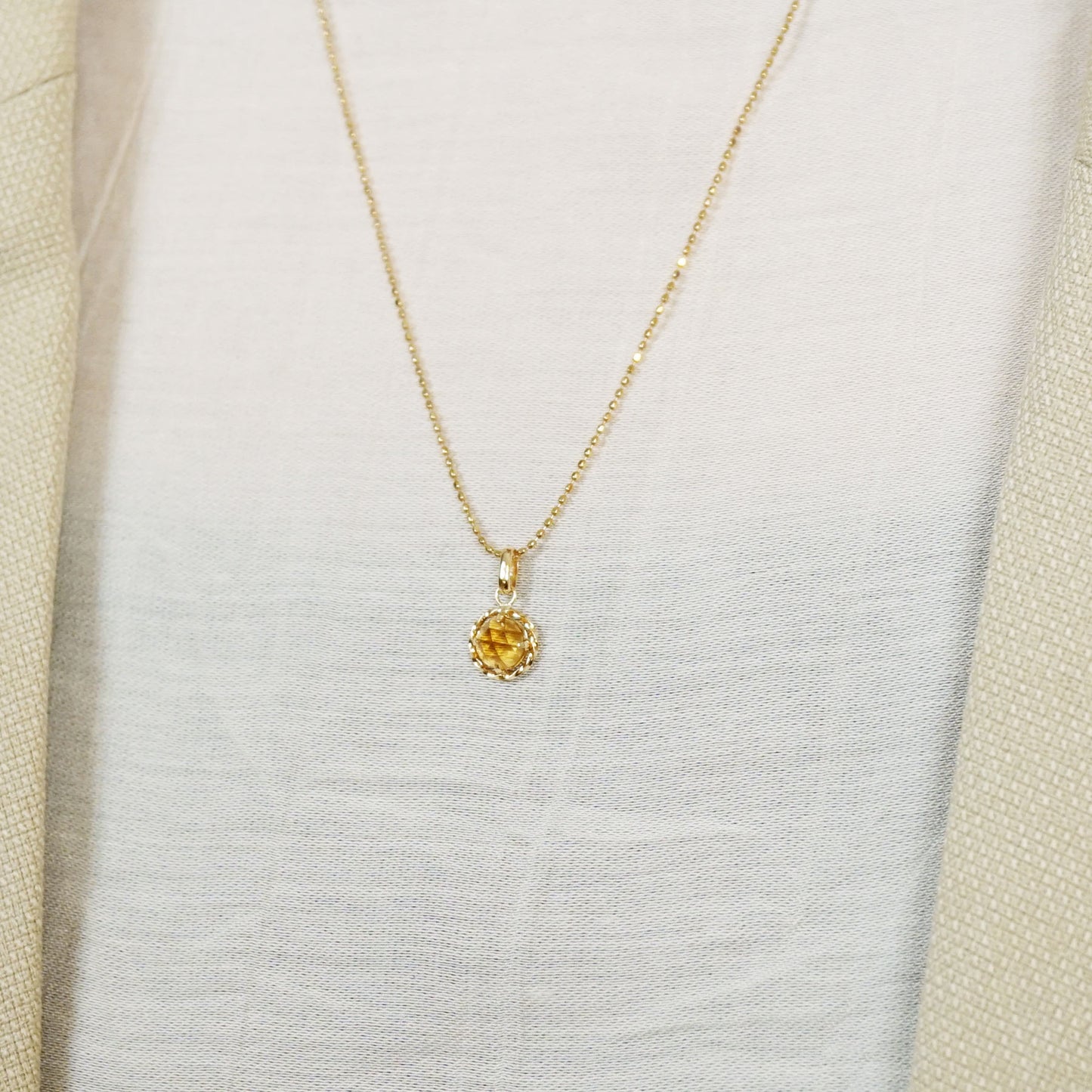 10K Citrine Necklace Charm (Yellow Gold) - Model Image