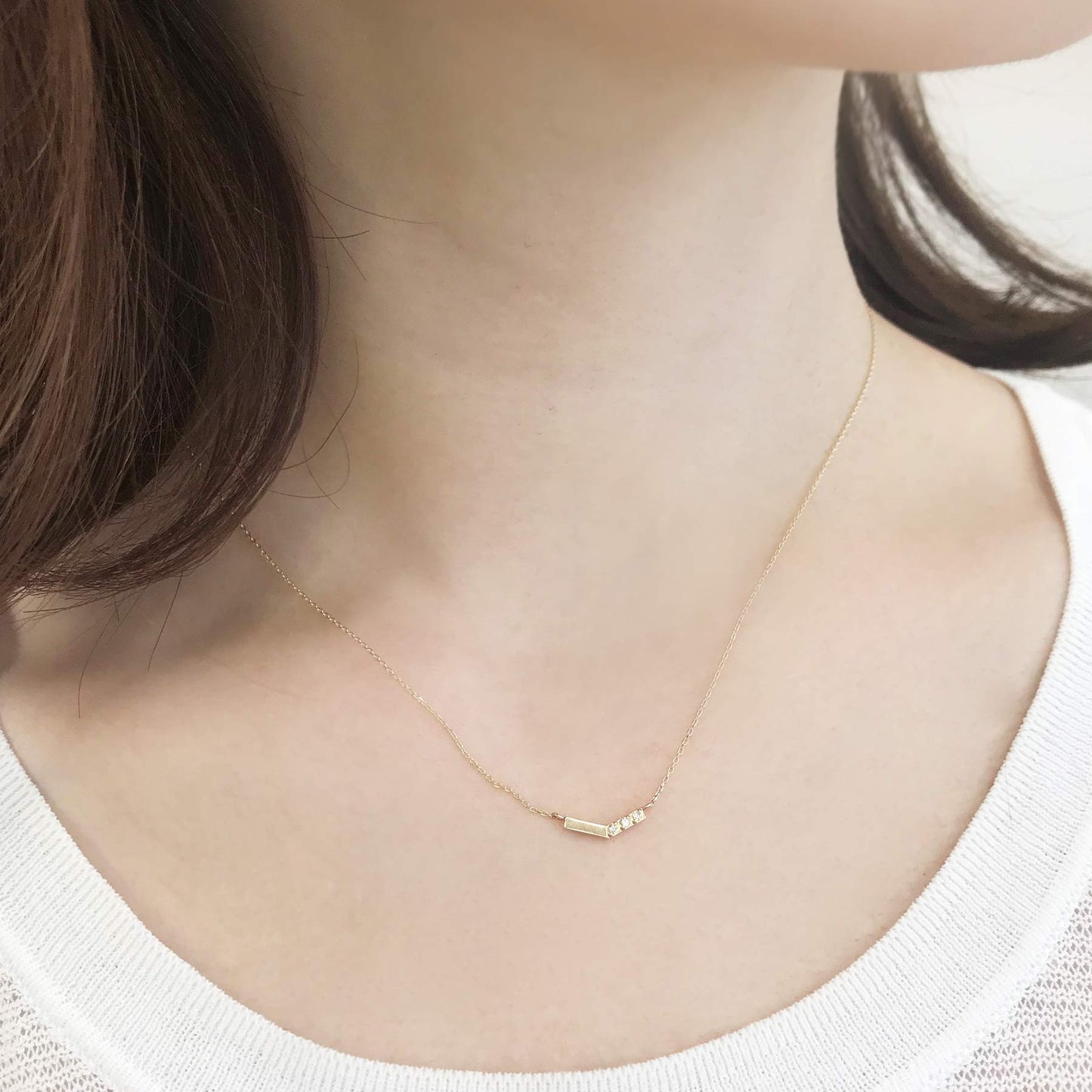 10K Yellow Gold Diamond V-Shaped 3-Stone Necklace - Model Image