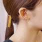 10K White Gold Glittering Wave Ear Cuff - Model Image