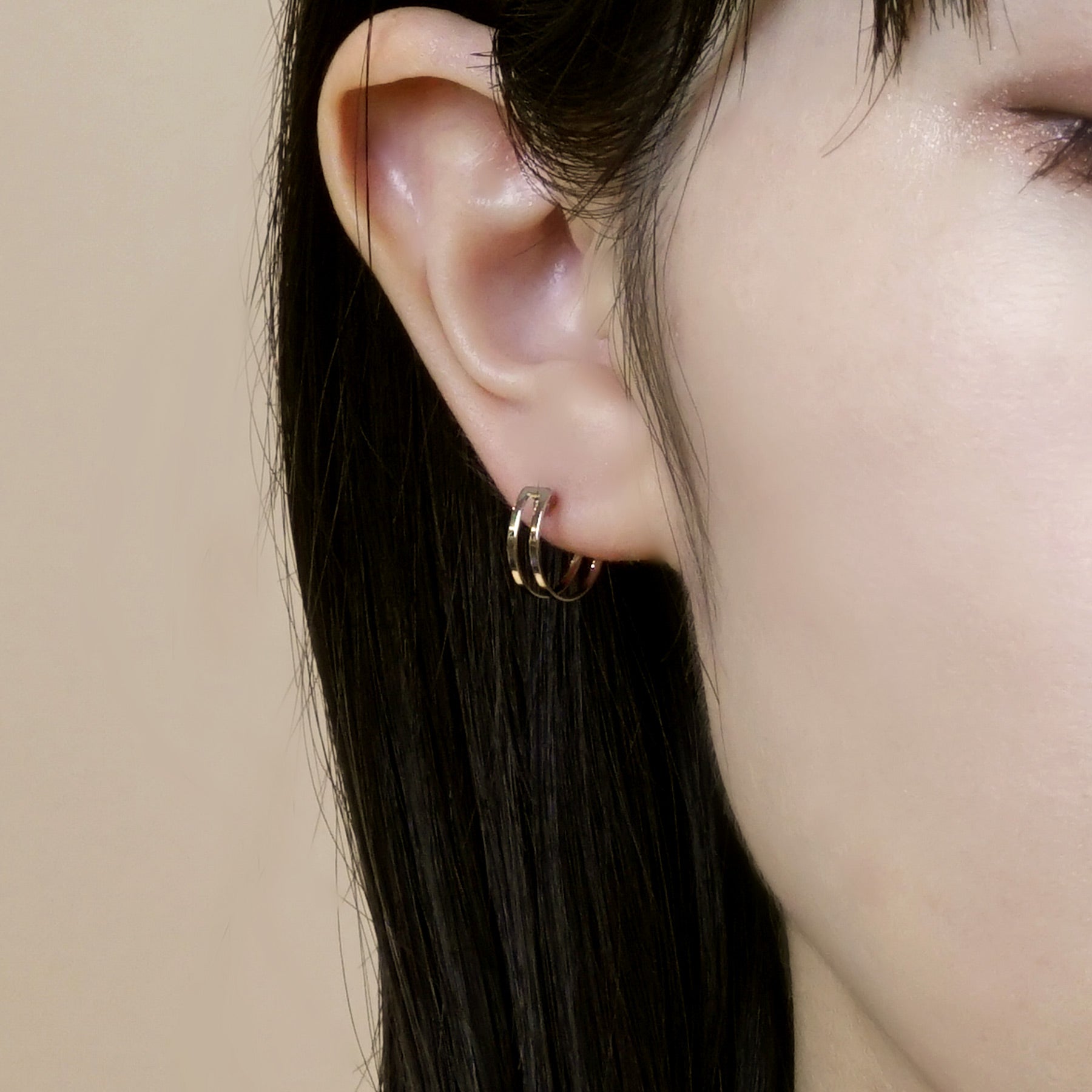 14K/10K White Gold Mini Hoop Earrings - Model Image